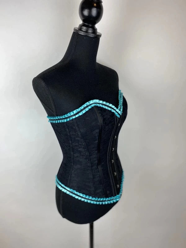 Extravagante Corsage in schwarz