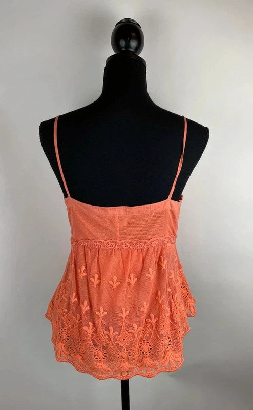 Leuchtendes Top mit Spitze