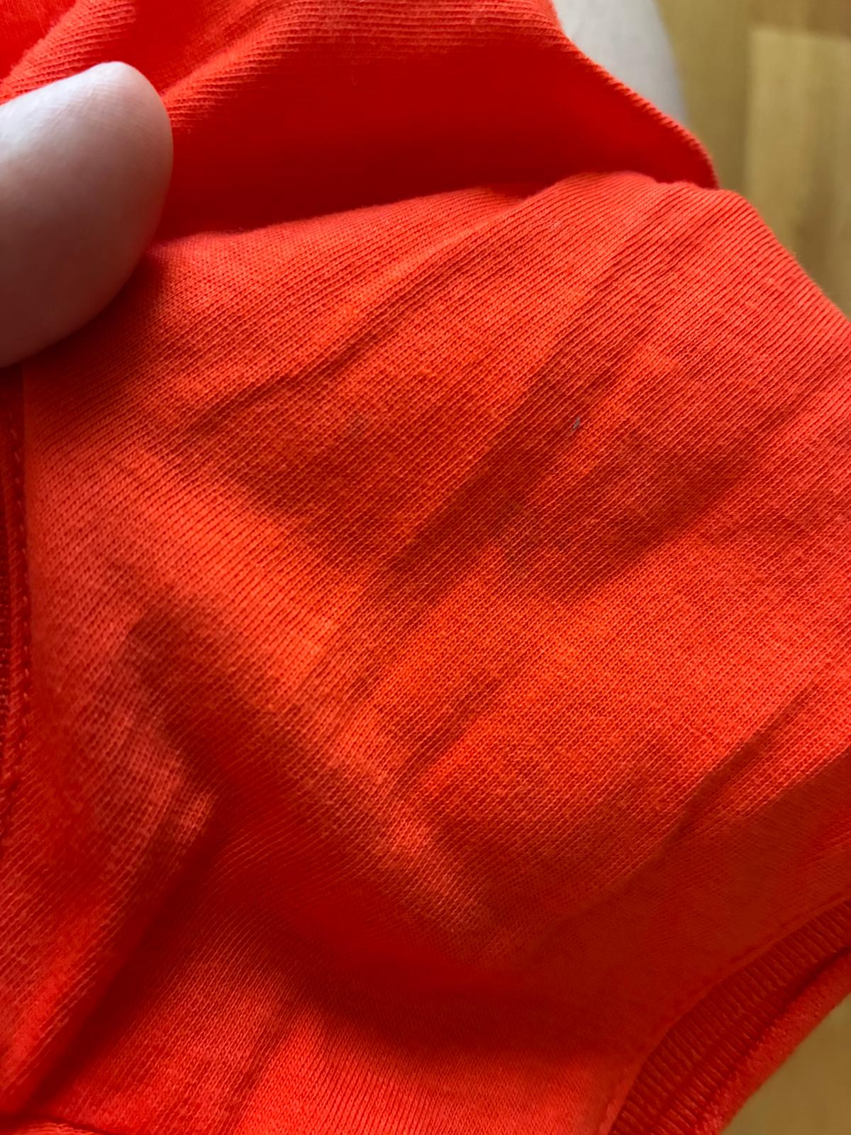 Leuchtendes Top in Rot
